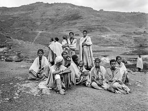 Group of Ethiopians sit in the desert